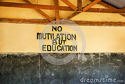 Masai-Mara tribe, Kenya - January 18, 2019: Blackboard texture background in the Masai-Maraâ€™s school with slogan of school. Editorial Stock Photo