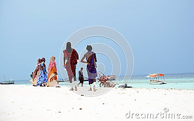 Masai and muslim people at the beach, Zanzibar Editorial Stock Photo