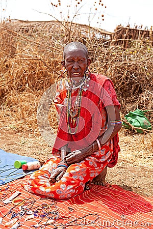 Masai woman is showing traditional jewelry Editorial Stock Photo