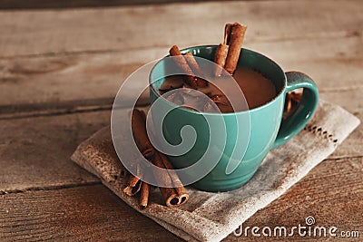 Masala chai with spices. Cinnamon Stick, Thai Cardamom, Ginger, Clove, Star Anise, Black Peppercorns, Fennel Seeds, Black Tea Stock Photo