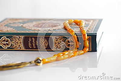 The Masbaha, also known as Tasbih with the Quaran Stock Photo