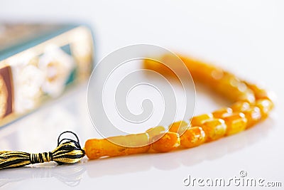 The Masbaha, also known as Tasbih with the Quaran Stock Photo