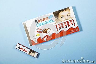 Mascara, Algeria -May 03, 2023: Closeup of Kinder Chocolate Candy made by Ferrero SpA isolated on blue background Editorial Stock Photo