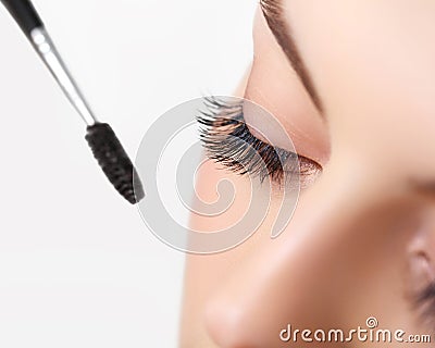 Mascara Brush. Woman eye with long eyelashes. Stock Photo