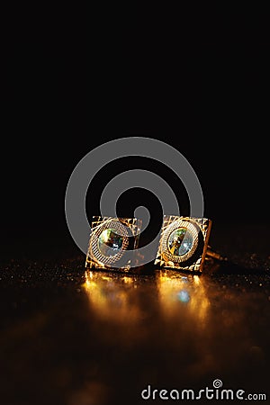 Masculine accessory - golden cufflinks Stock Photo