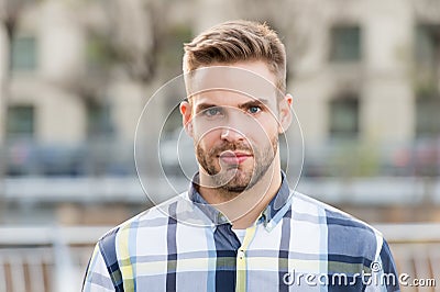 Masculine appearance. Handsome man unshaven face and stylish hair. Caucasian man urban background. Bearded man in casual Stock Photo