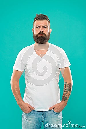 Masculine and brave. Beard fashion and barber concept. Man bearded hipster stylish beard turquoise background. Barber Stock Photo