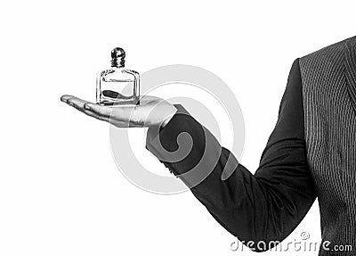 Masculine perfume. Man perfume, fragrance. Male holding bottle of perfume, isolated on white background. Black and white Stock Photo