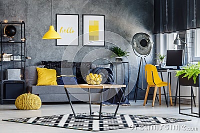 Masculine room with yellow decor Stock Photo