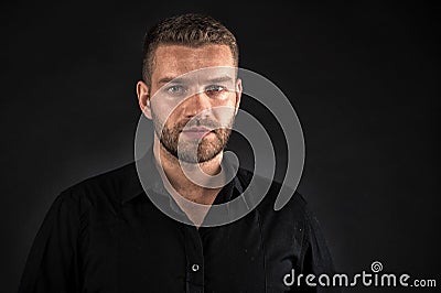 Masculinity and confidence. Business man face confident with bristle beard close up. Business man formal black clothing Stock Photo