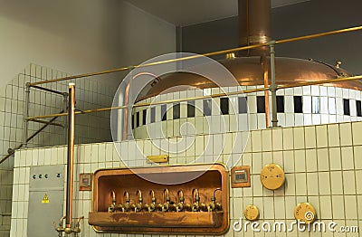 Mash tun and wort siphoning valves in brewery. Stock Photo