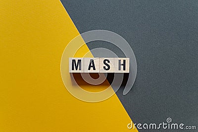 Mash - word concept on cubes Stock Photo