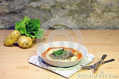 Mashed potato meal with mushroom. Roast beef smothered in mushroom gravy with mashed potatoes. Tasty home food withvegetables Stock Photo