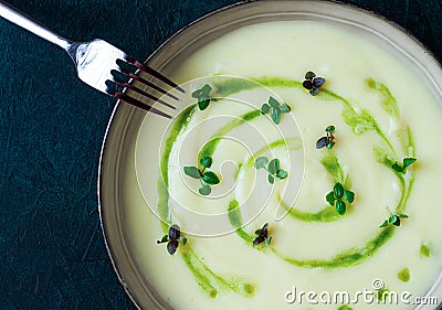 Mashed potatoes, with green butter, micro greenery, homemade, on a dark background, no people, top view, Stock Photo