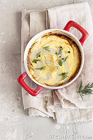 Mashed potatoes, mushrooms and seasonal vegetables casserole in baking dish. Vegetarian shepherd`s pie Stock Photo