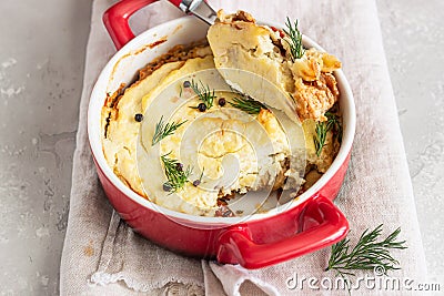 Mashed potatoes, mushrooms and seasonal vegetables casserole in baking dish. Vegetarian shepherd`s pie Stock Photo