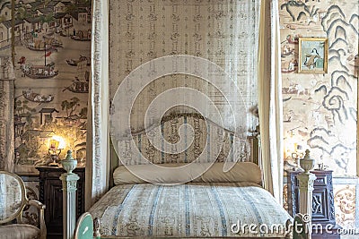 Masino, Italy - baroque bedroom in old castle. Vintage interior, original from 18th Century Editorial Stock Photo