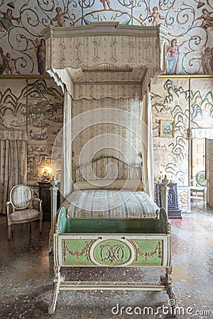 Masino, Italy - baroque bedroom in old castle. Vintage interior, original from 18th Century Editorial Stock Photo