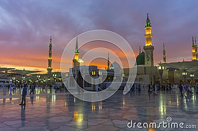 Masjid nabwi minerats and green dome in a dusky evening Madina, saudi arabia. Stock Photo