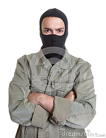 Masked burglar with crossed arms Stock Photo