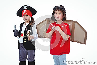 Masked kids pretending to be pirate and pilot Stock Photo