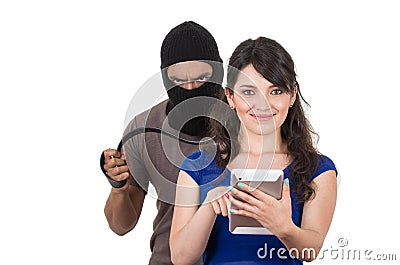 Masked male thief robbing beautiful young girl Stock Photo