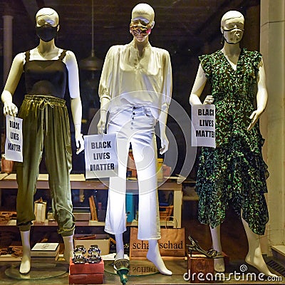 Masked mannequin display highlighting key issues in 2020 Editorial Stock Photo