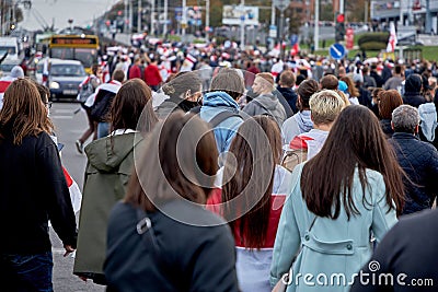 Masked participant of peaceful protests in Belarus. People at a protest in Belarus Editorial Stock Photo