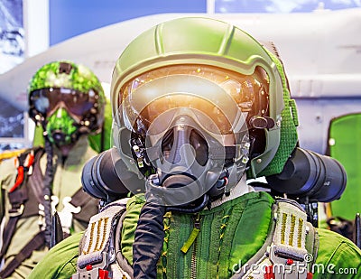 The masked pilot with oxygen equipment inside the cockpit of a military fighter jet Stock Photo