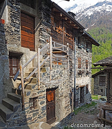 Maslana is an ancient rural village accessible only on foot. Valbondione, Bergamo, Orobie Alps, Italy Stock Photo