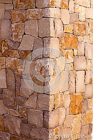 Masonry stone wall corner detail construcion work Stock Photo