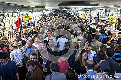 A mass of people move through an underpass at Eminonu in Istanbul in Turkey. Editorial Stock Photo