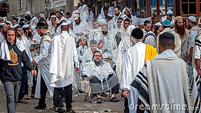 Mass prayer. Hasids pilgrims in traditional clothes. Rosh-ha-Shana festival, Jewish New Year. Editorial Stock Photo