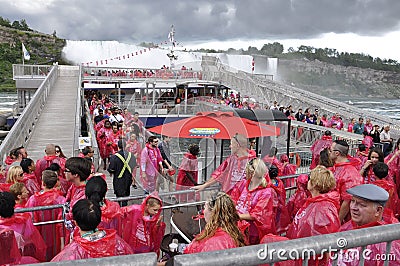 Canada, 26th june: Tourists journay behind the Niagara Waterfall Editorial Stock Photo
