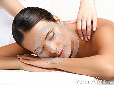 Massage. Close-up of a Beautiful Woman Getting Spa Treatment Stock Photo