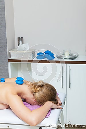 Massage with cupping glass in beautician Stock Photo