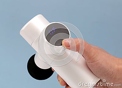 Massage Gun Deep Tissue Massage Machine Handheld Percussion Massager for Muscle Recovery and Pain Back Relief Stock Photo