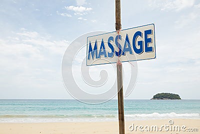 Massage sign on tropic beach background Stock Photo