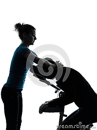 Massage therapy with chair silhouette Stock Photo