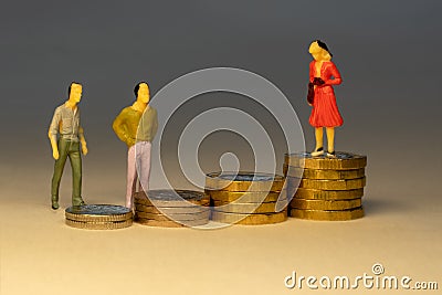 The masses looking to business woman standing on top of increasing piles of gold coins. Business career concept Stock Photo