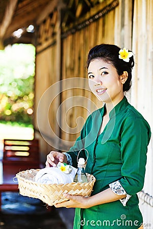 Masseuse holding spa ingredients Stock Photo