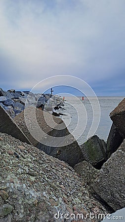 Massive concrete blocks, sea pier Stock Photo
