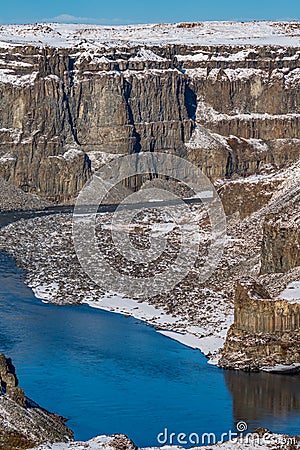 Massive deep canyon with vertical walls, vertical composition Stock Photo