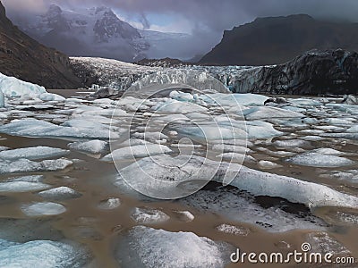 Massive glacier tongue end melt down with icebergs Stock Photo