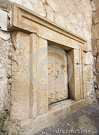 Massive stone door Stock Photo