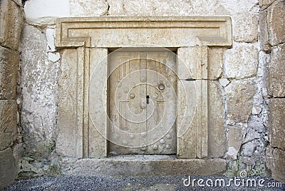 Massive stone door Stock Photo