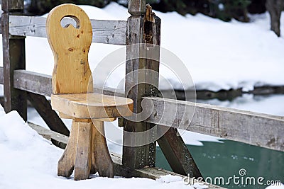 Massive wooden chair standing outdoor Stock Photo