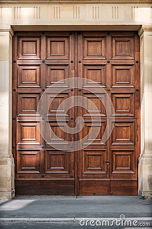 Massive wooden door entrance - big wood gate Stock Photo