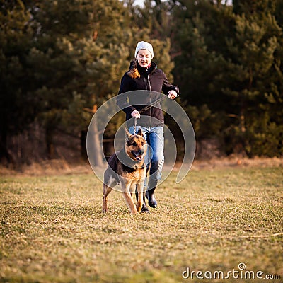 Master and her obedient dog Stock Photo