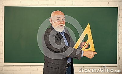 Master the Key Concepts. back to school. mathematics and people concept. Mathematics at board. favorite subject. senior Stock Photo